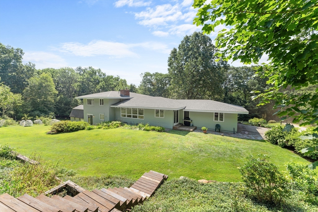 46 Highland Road Boxford, MA 01921 - Photo 2 of 41 a view of a house with a yard and furniture