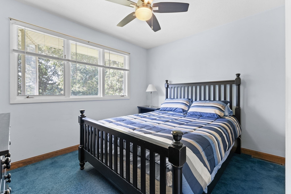 46 Highland Road Boxford, MA 01921 - Photo 22 of 41 a bedroom with a bed and window