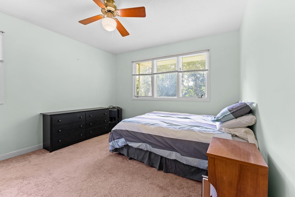 46 Highland Road Boxford, MA 01921 - Photo 25 of 41 a bedroom with a bed and window
