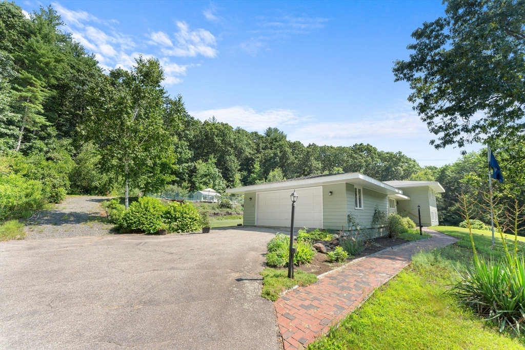 46 Highland Road Boxford, MA 01921 - Photo 3 of 41 a white house that has a tree in it