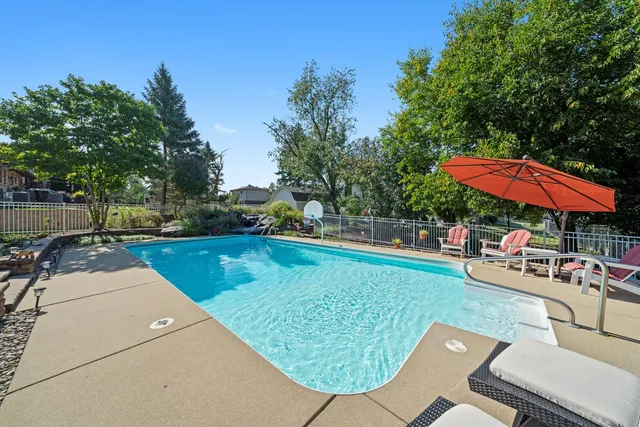 an outdoor space with patio lots of furniture