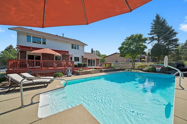 a view of a house with swimming pool