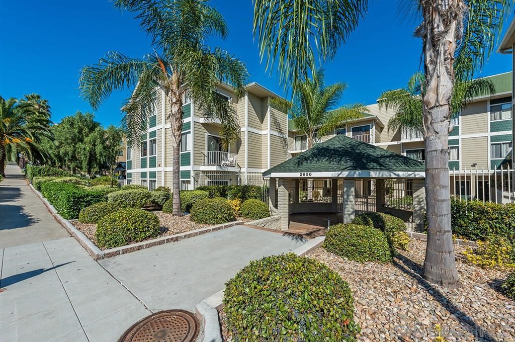 2650 Broadway, Unit 314 San Diego, CA 92102 - Photo 2 of 16 a view of a house with a yard and potted plants