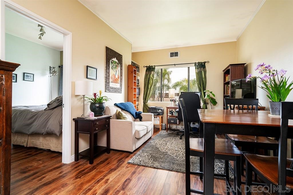 2650 Broadway, Unit 314 San Diego, CA 92102 - Photo 9 of 16 a living room with furniture and wooden floor