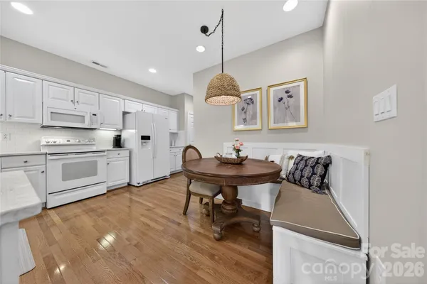 a workspace with furniture and window