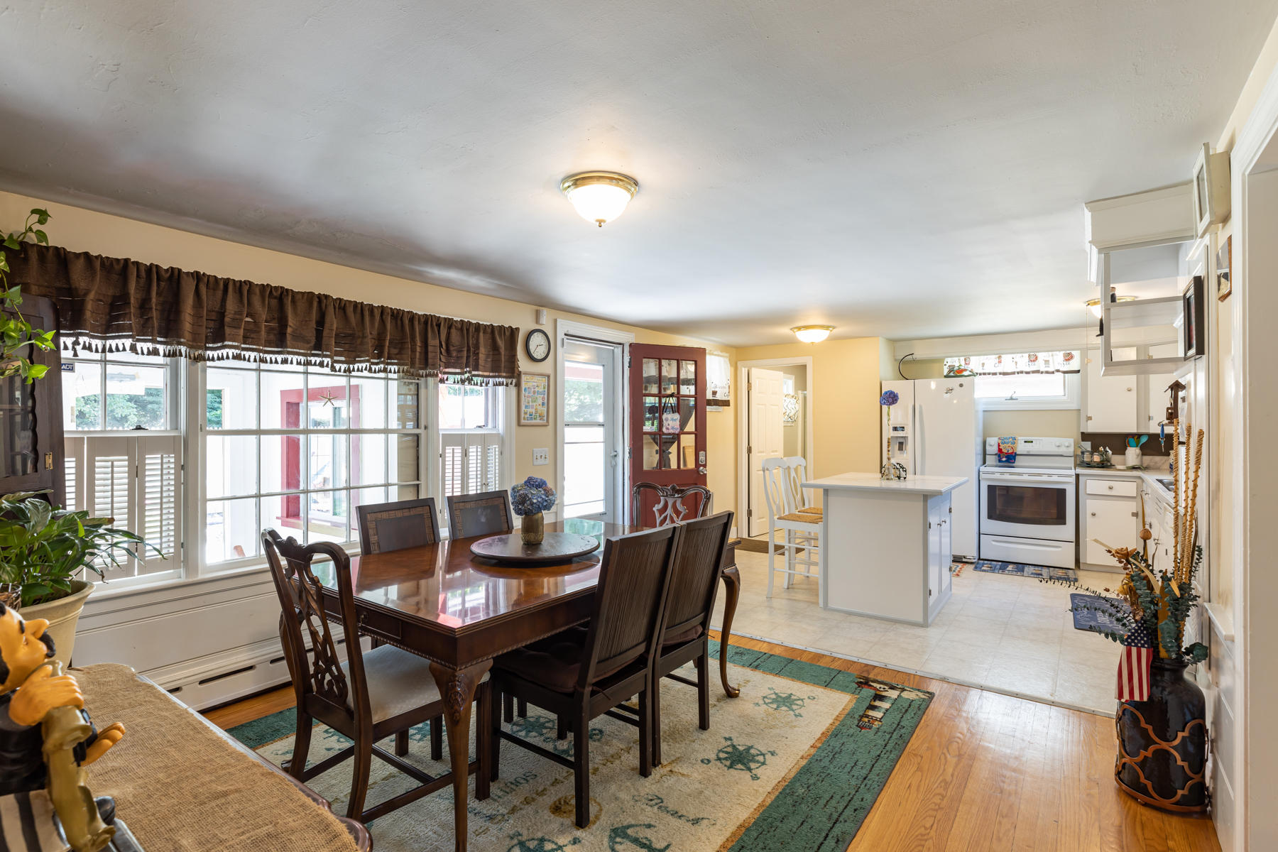 64 Murphy Road Hyannis, MA 02601 - Photo 11 of 64 a view of a dining room with furniture window and wooden floor