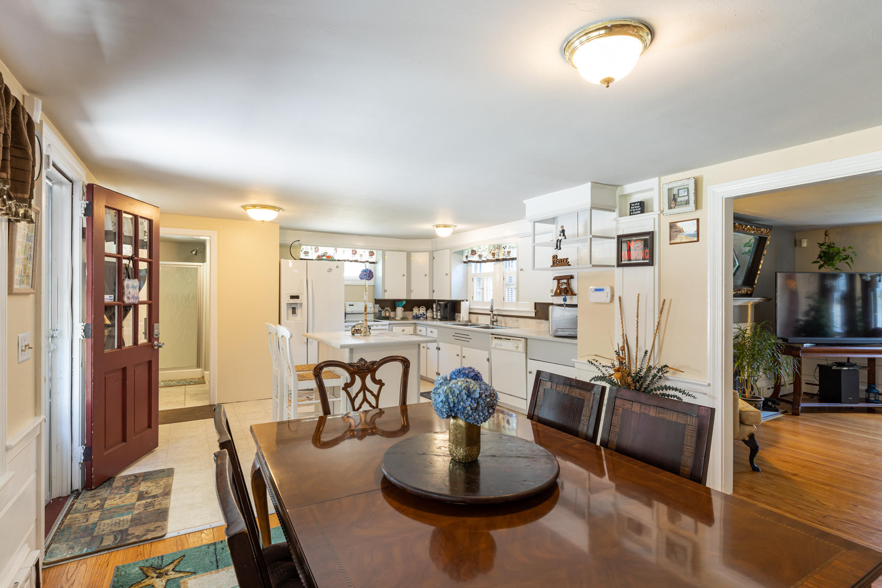 64 Murphy Road Hyannis, MA 02601 - Photo 12 of 64 a living room with lots of furniture and kitchen view