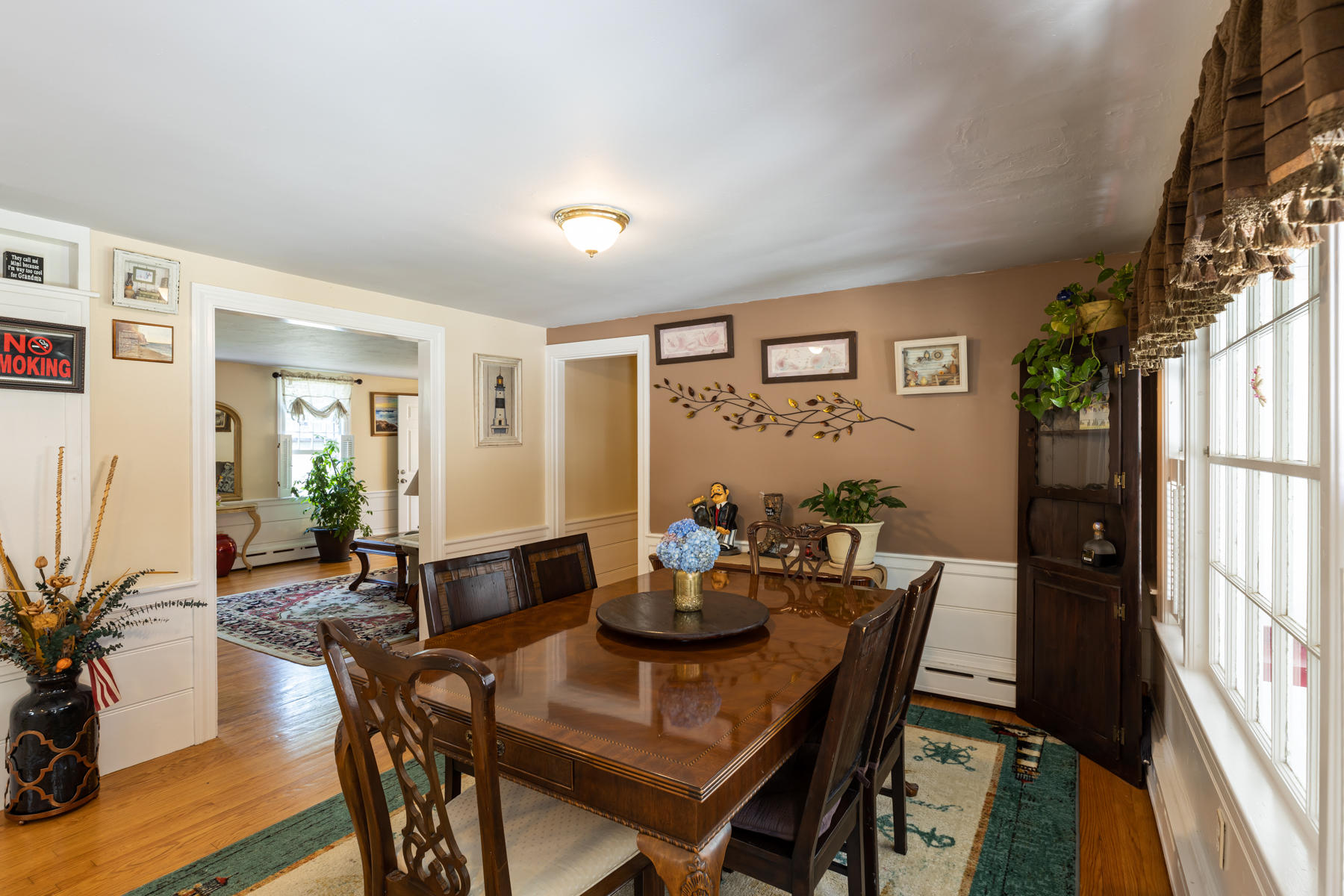 64 Murphy Road Hyannis, MA 02601 - Photo 13 of 64 a view of a dining room with furniture window and wooden floor