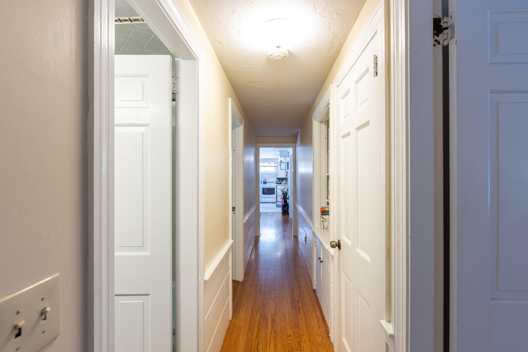 64 Murphy Road Hyannis, MA 02601 - Photo 22 of 64 a view of a hallway with wooden floor and staircase
