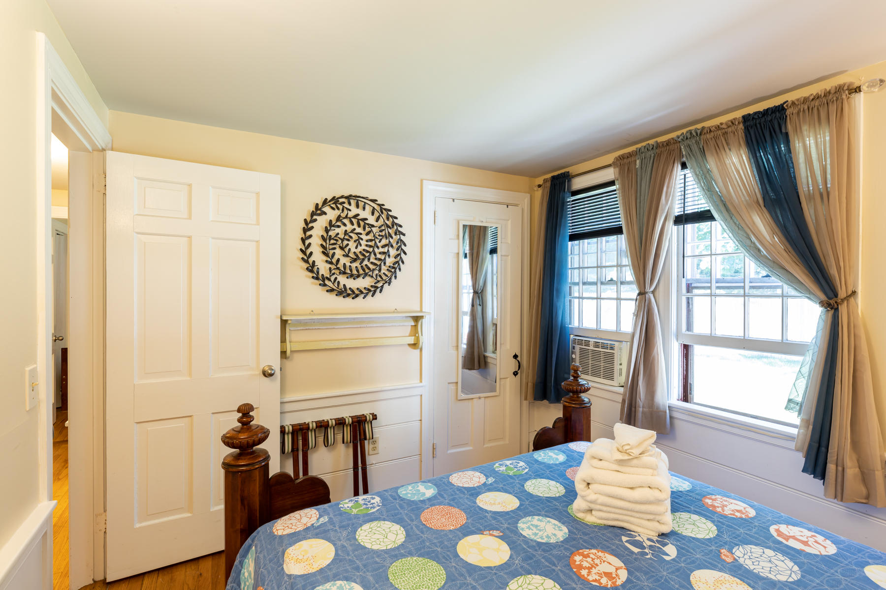 64 Murphy Road Hyannis, MA 02601 - Photo 24 of 64 a bedroom with a bed and a table with chair