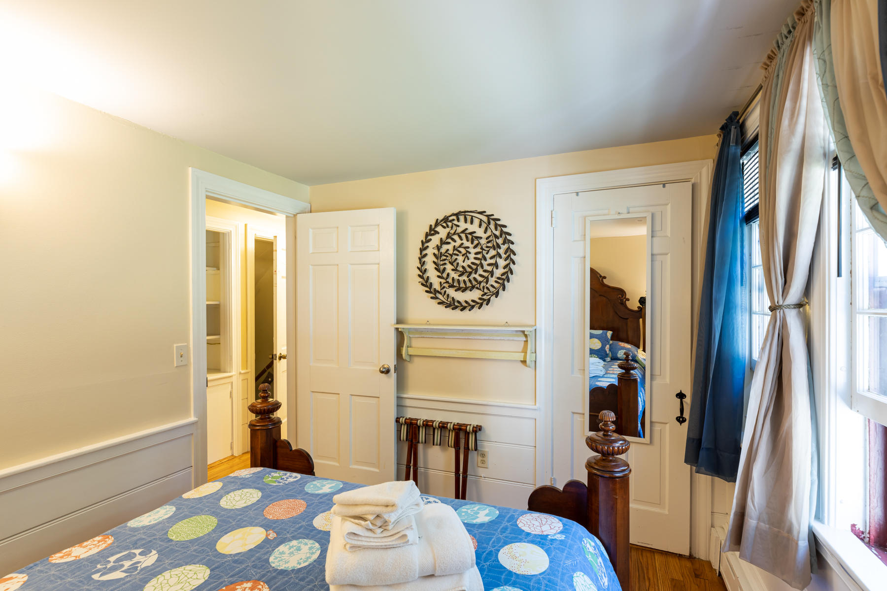 64 Murphy Road Hyannis, MA 02601 - Photo 25 of 64 a bedroom with a bed and a table in it