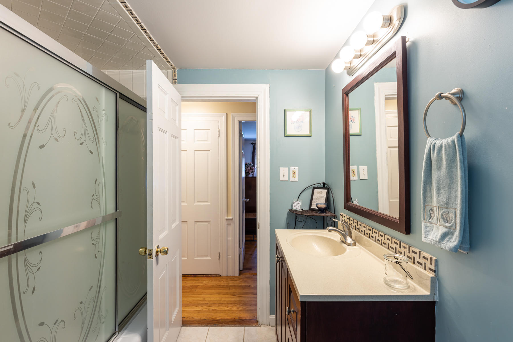 64 Murphy Road Hyannis, MA 02601 - Photo 29 of 64 a bathroom with a sink vanity and a mirror