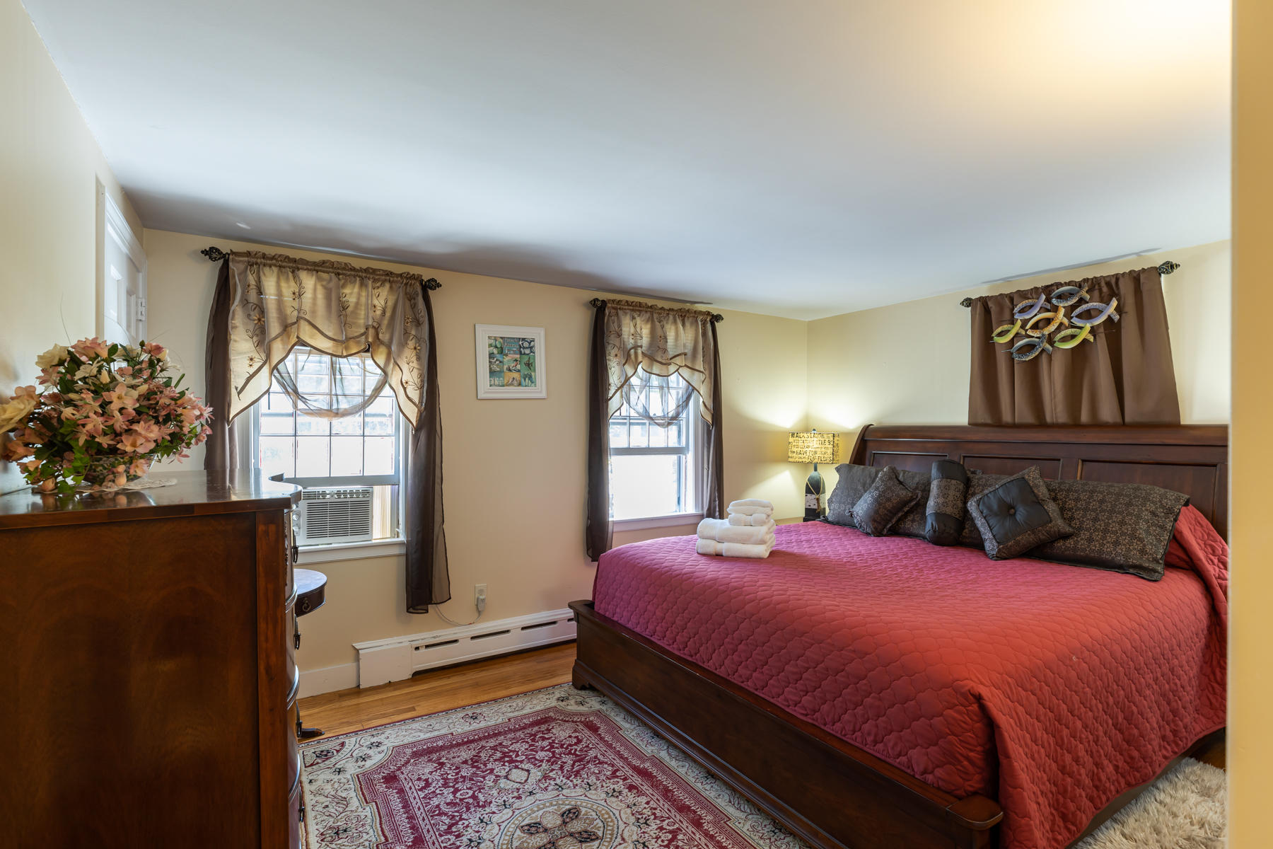 64 Murphy Road Hyannis, MA 02601 - Photo 30 of 64 a bedroom with a large bed and a window