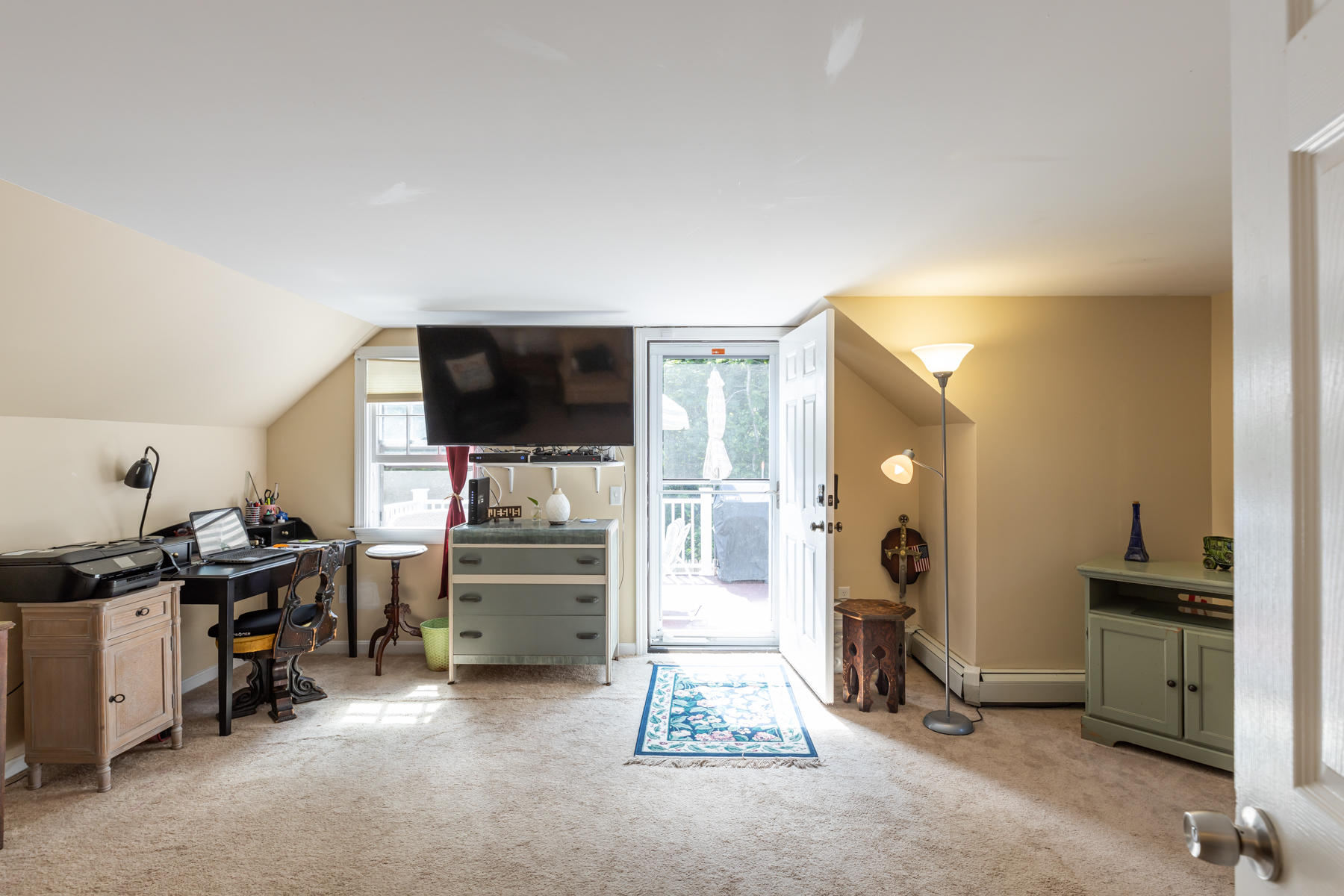 64 Murphy Road Hyannis, MA 02601 - Photo 44 of 64 a room with furniture and a flat screen tv