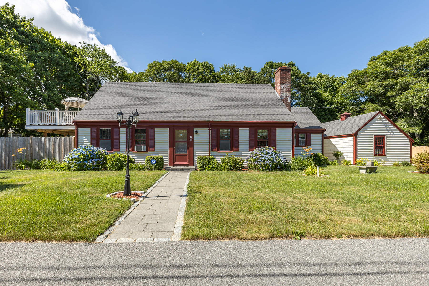 64 Murphy Road Hyannis, MA 02601 - Photo 5 of 64 a front view of a house with a yard