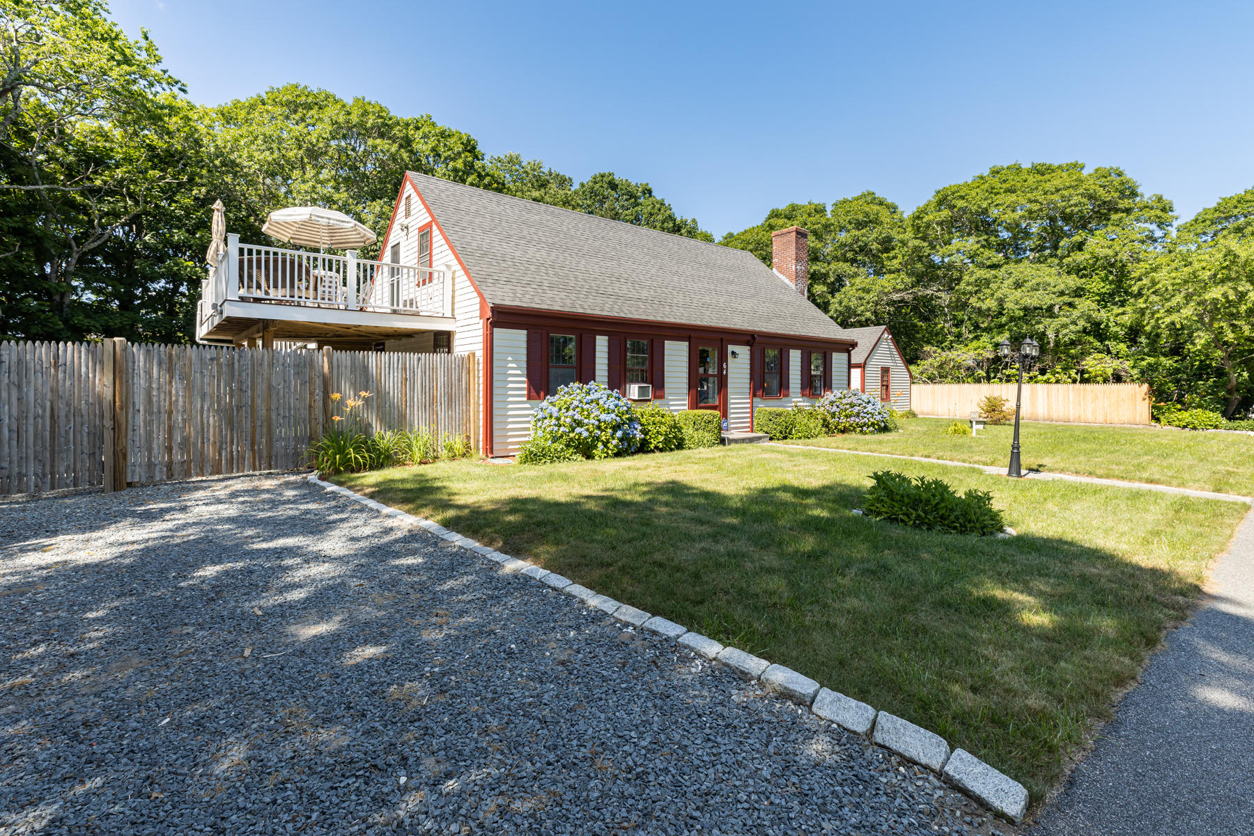 64 Murphy Road Hyannis, MA 02601 - Photo 60 of 64 a front view of a house with garden