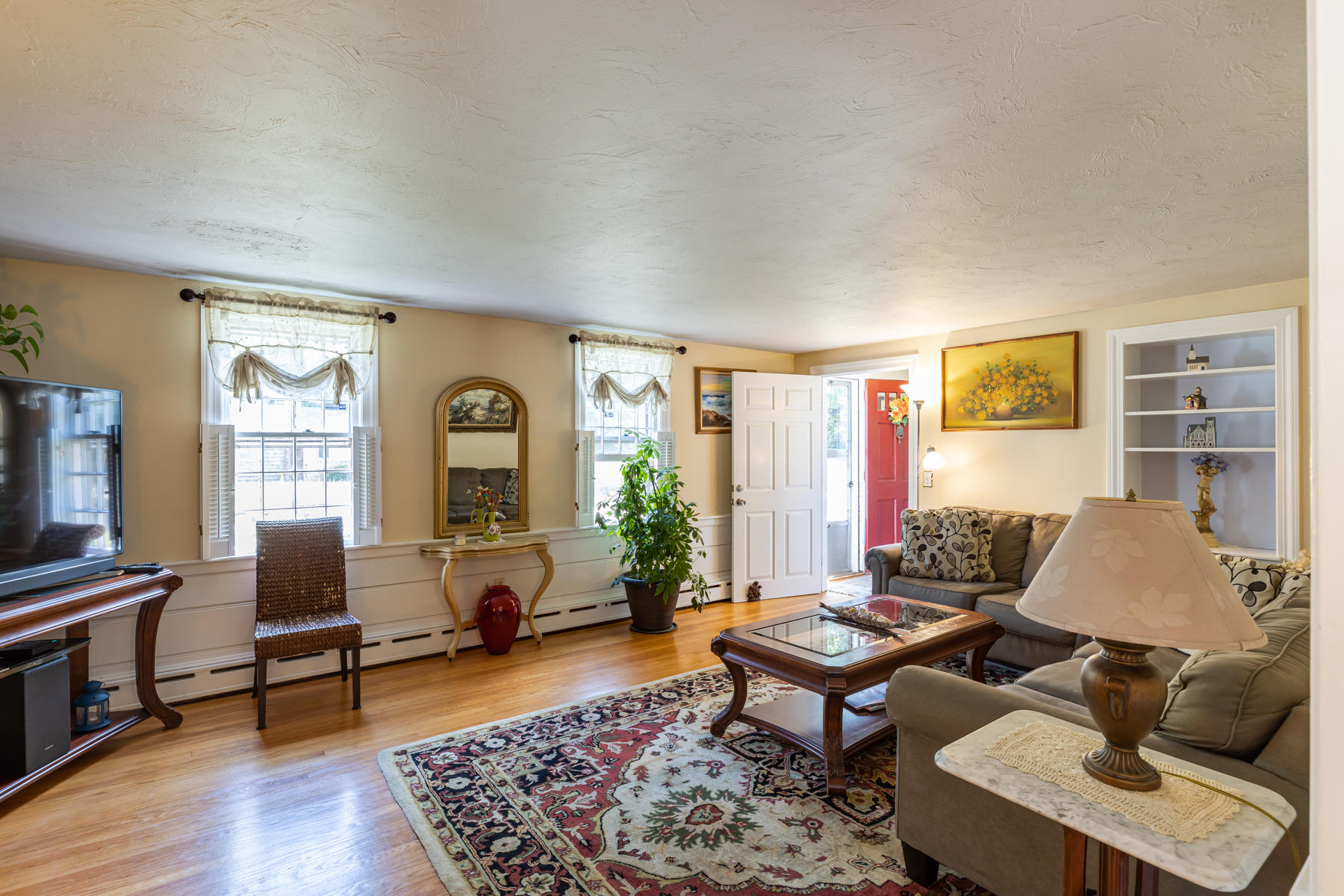 64 Murphy Road Hyannis, MA 02601 - Photo 8 of 64 a living room with furniture a rug and a window