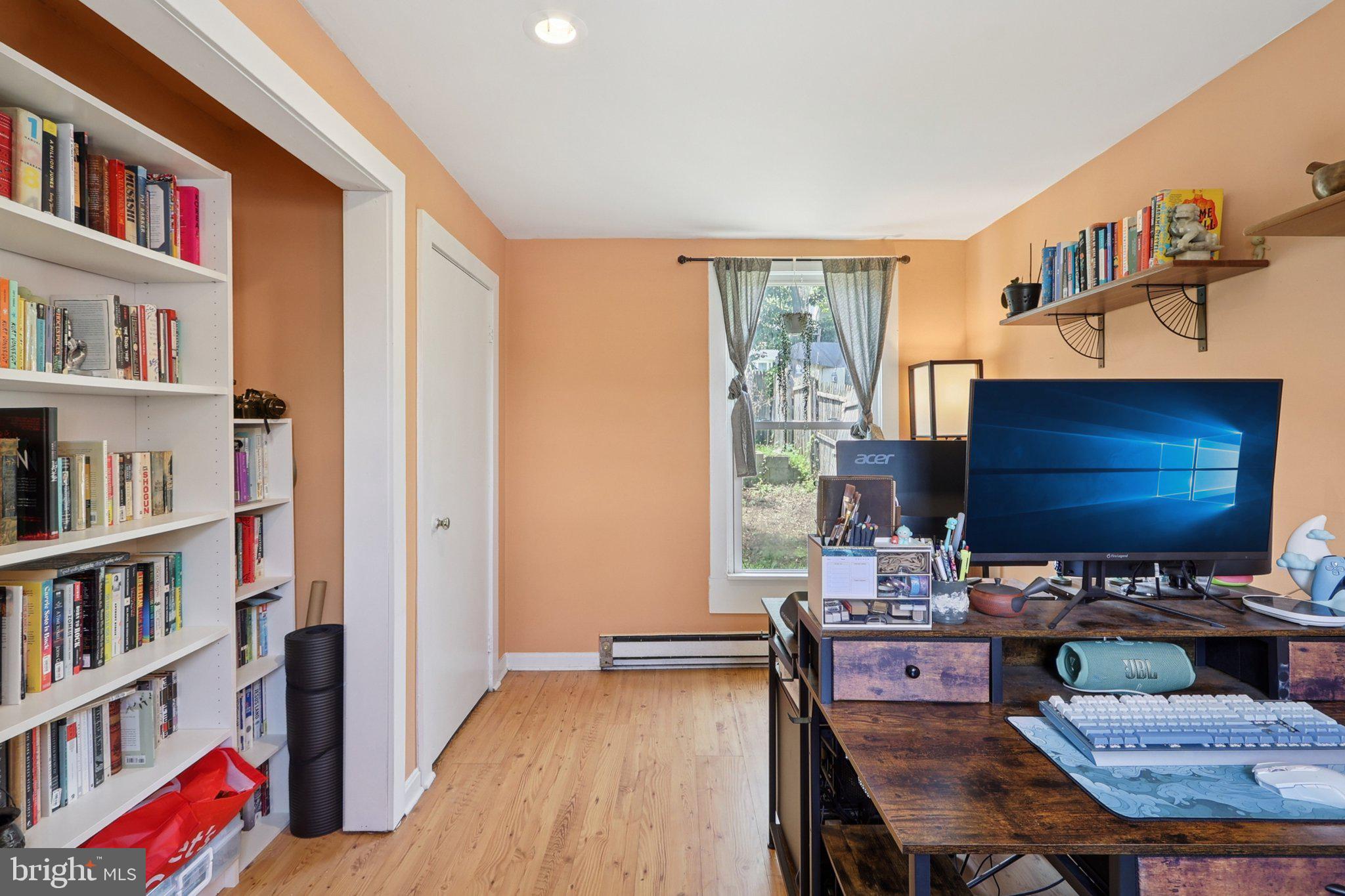 1610 Midland Road Edgewater, MD 21037 - Photo 12 of 27 a room with furniture and a book shelf