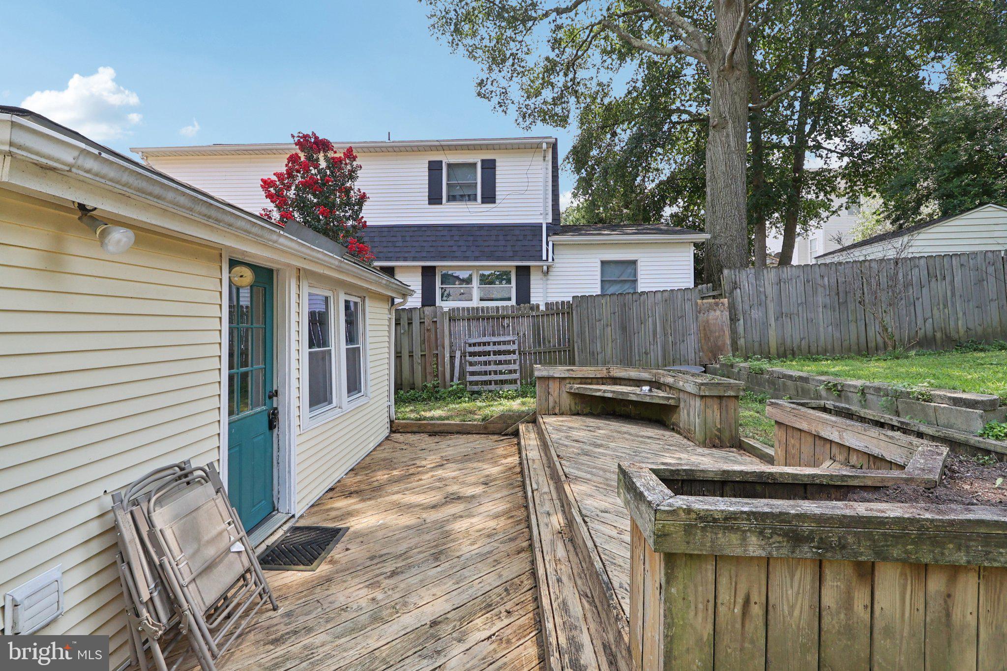 1610 Midland Road Edgewater, MD 21037 - Photo 17 of 27 a front view of a house with garden