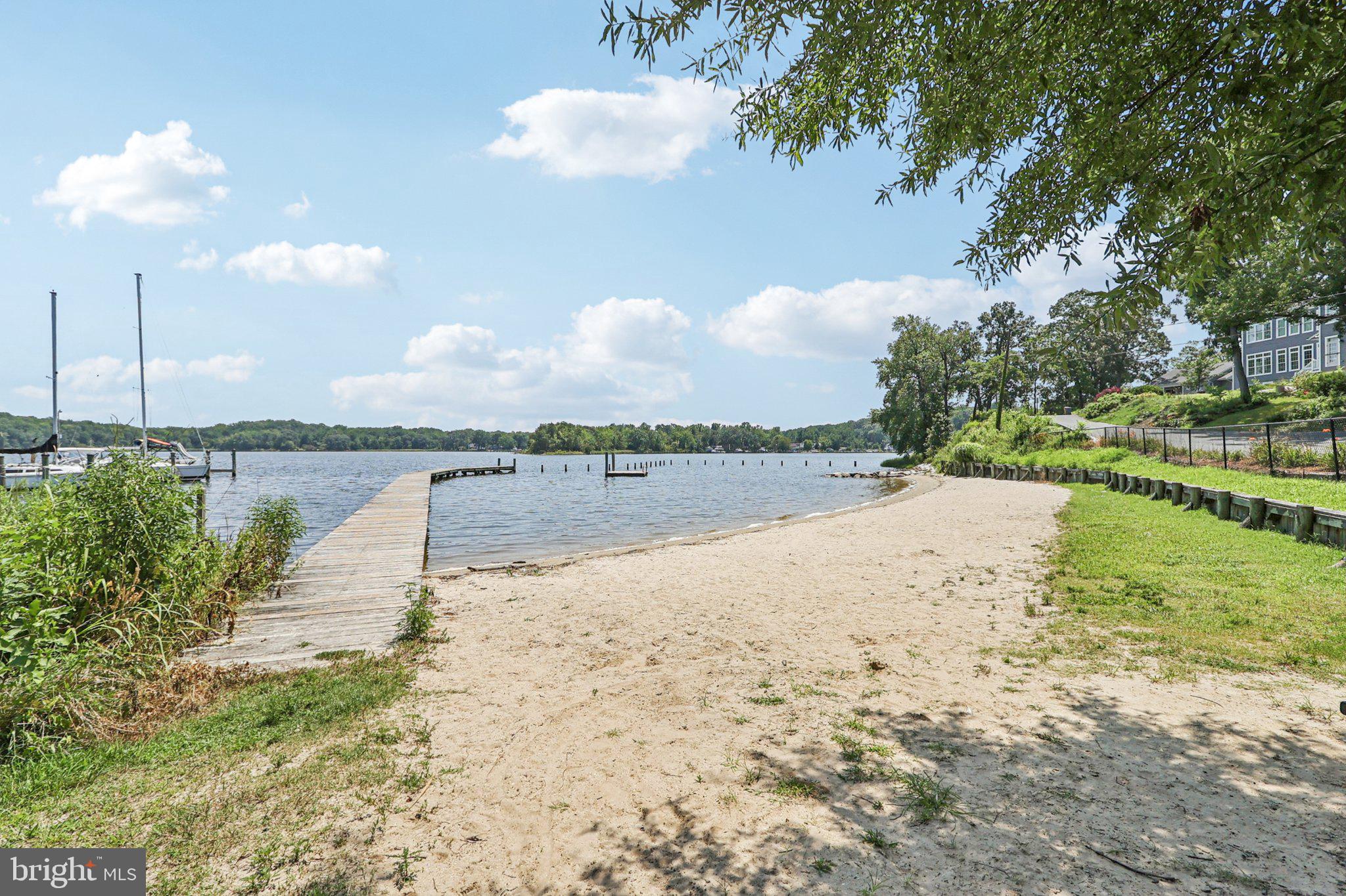 1610 Midland Road Edgewater, MD 21037 - Photo 22 of 27 a view of a lake and a yard