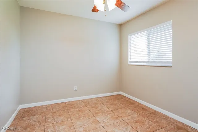 a bathroom with a sink a mirror and a toilet