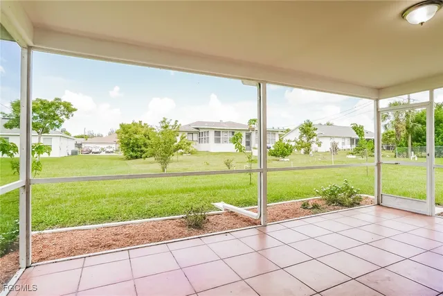 a view of a porch with a big yard