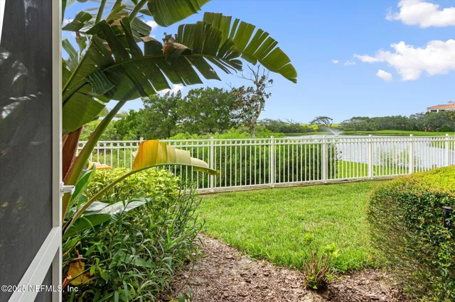 a view of a garden with a lake