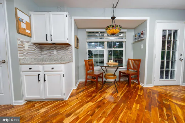 a view of a livingroom with furniture and window