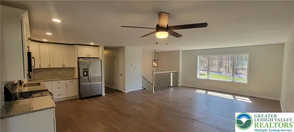 a view of wooden floor with a balcony