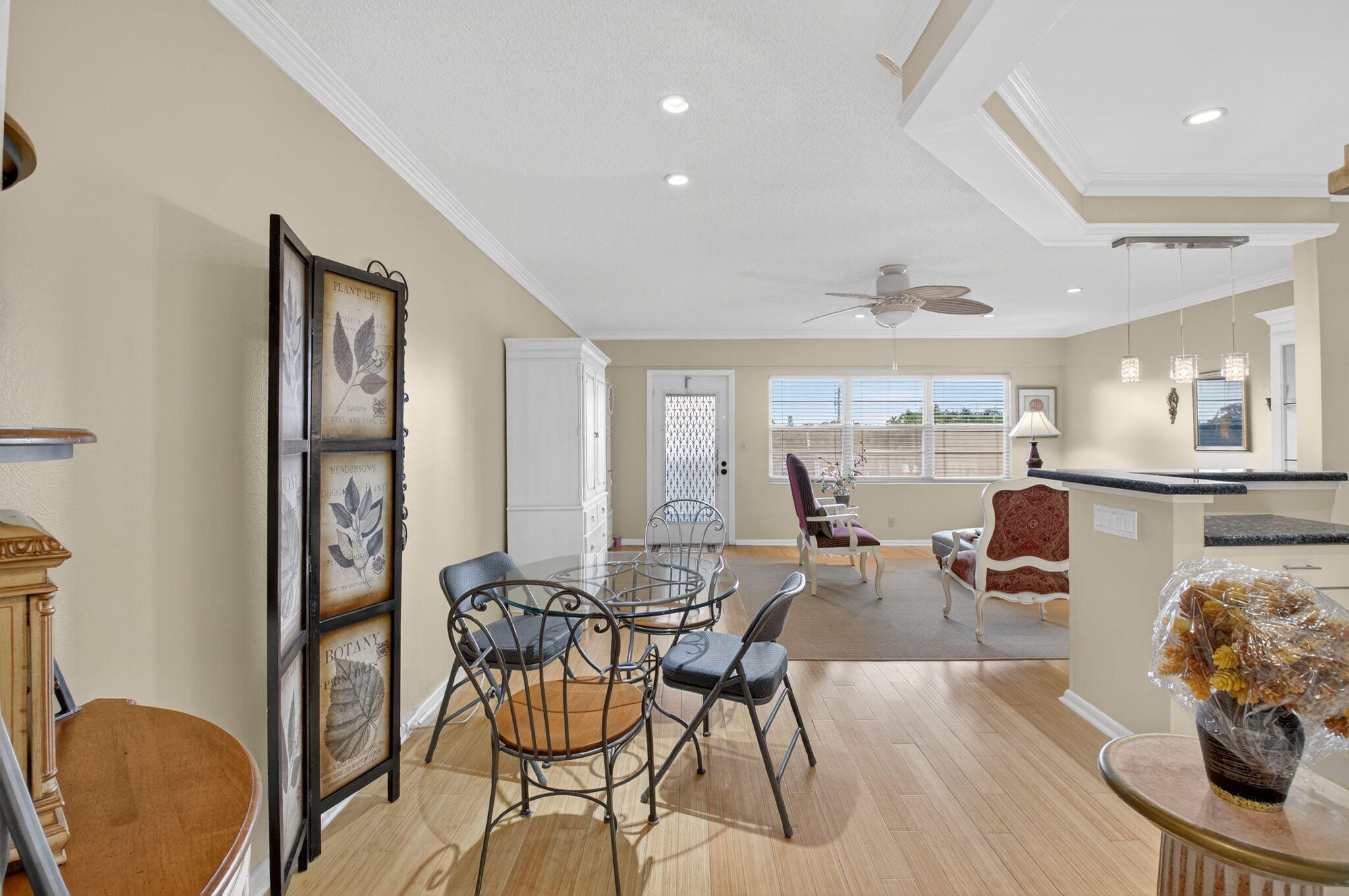 125 Suffolk C Boca Raton, FL 33434 - Photo 8 of 50 a living room with furniture and a wooden floor