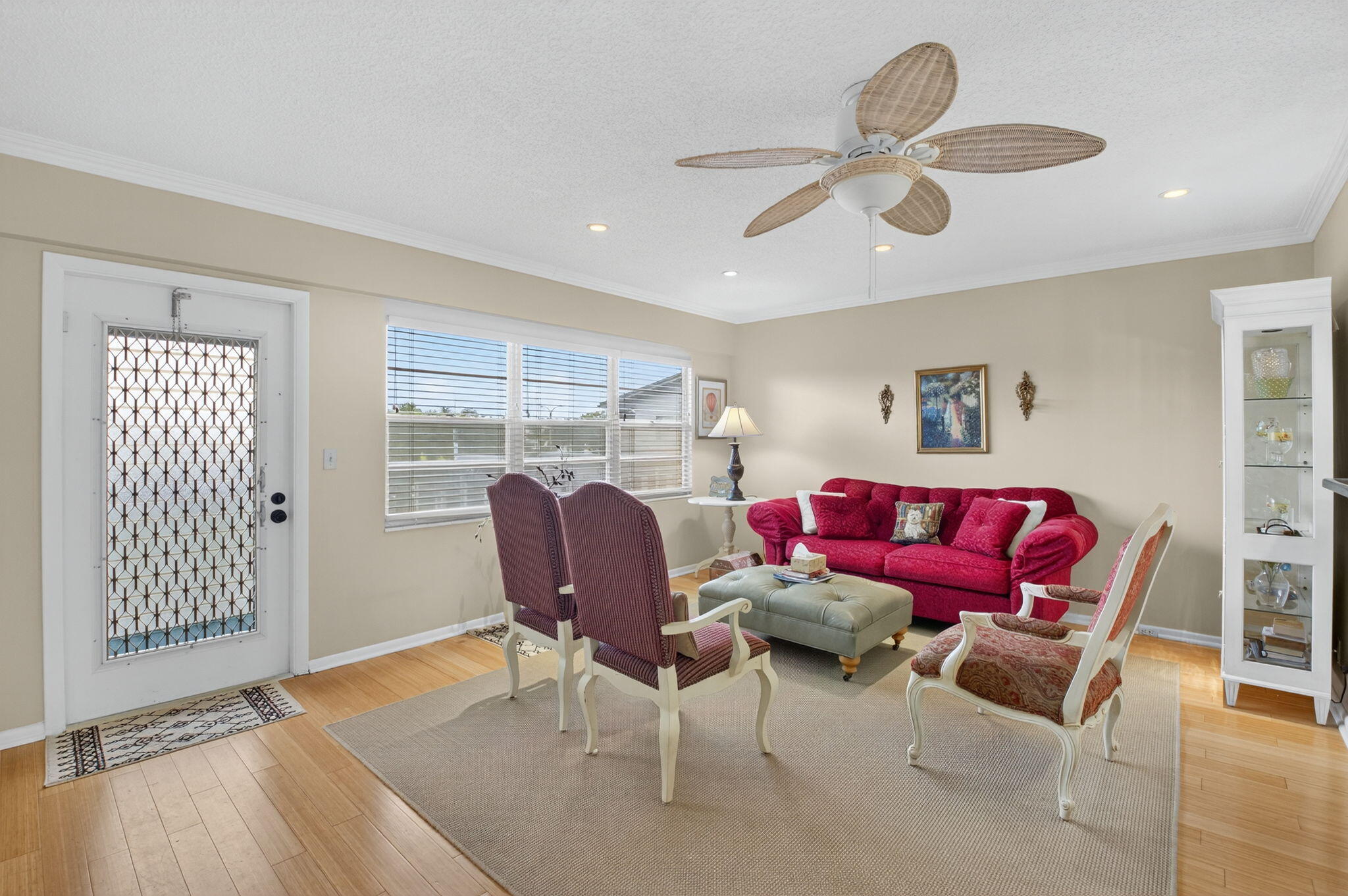 125 Suffolk C Boca Raton, FL 33434 - Photo 9 of 50 a living room with furniture and a window