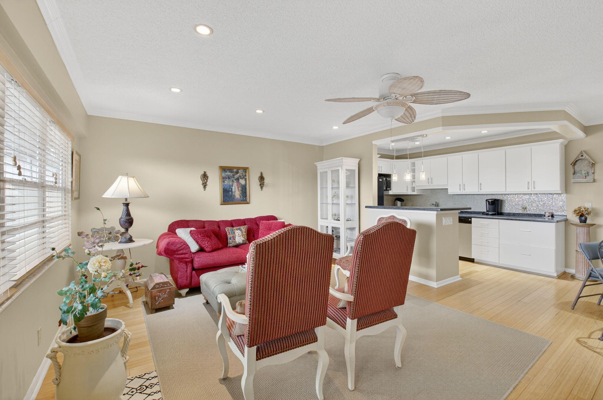 125 Suffolk C Boca Raton, FL 33434 - Photo 10 of 50 a living room with furniture and kitchen view