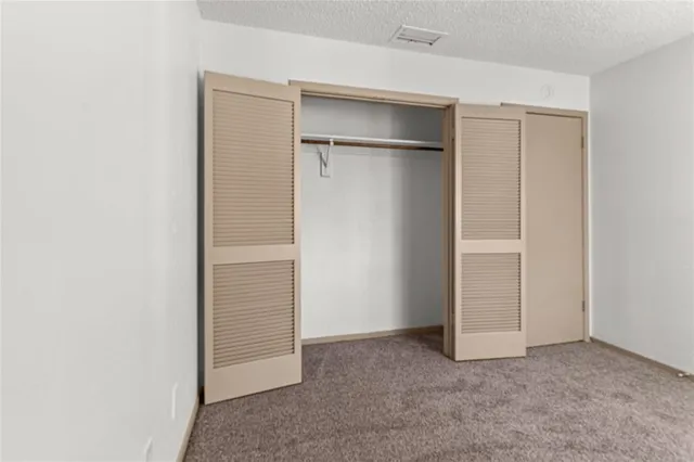an empty room with closet