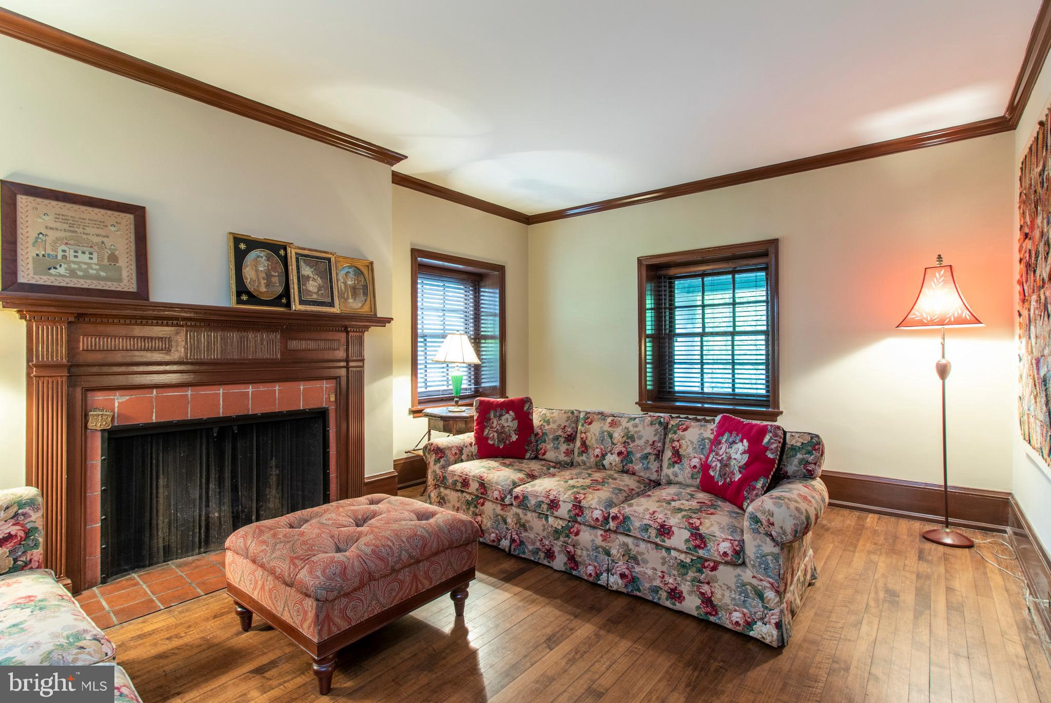 249 Forrest Road Merion Station, PA 19066 - Photo 12 of 35 Fireside living room w/ authentic woodwork & trim