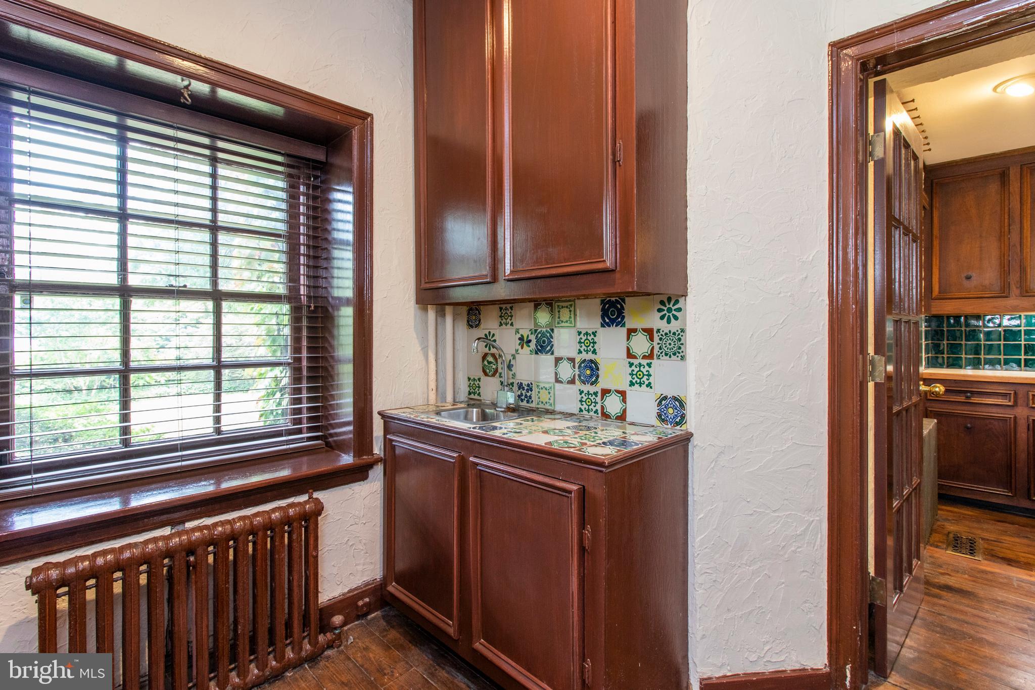 249 Forrest Road Merion Station, PA 19066 - Photo 14 of 35 Butlers pantry into kitchen from dining room