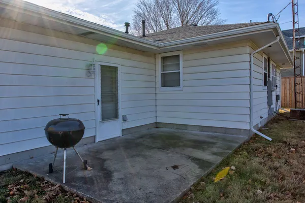 a view of a backyard of a house