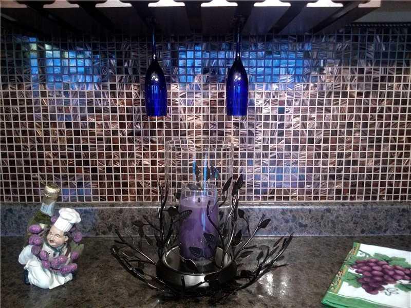 133 Klein Road New Brighton, PA 15066 - Photo 3 of 25 Kitchen. WINE COOLER WITH A WINE RACK READY FOR ENTERTAINING! BEAUTIFUL COPPER LOOK GLASS TILEWORK.