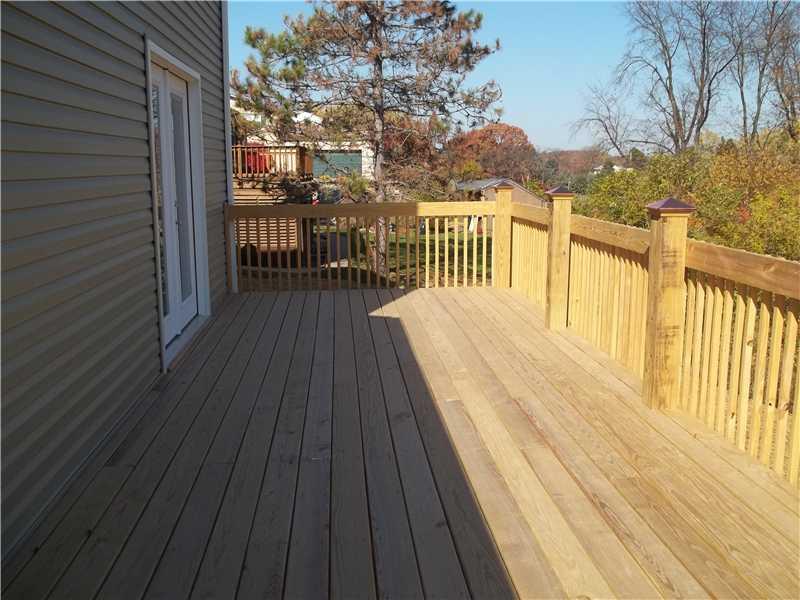 133 Klein Road New Brighton, PA 15066 - Photo 23 of 25 Patio/Deck. LARGE REAR DECK EXTENDING FROM THE KITCHEN PAST THE DININGROOM.