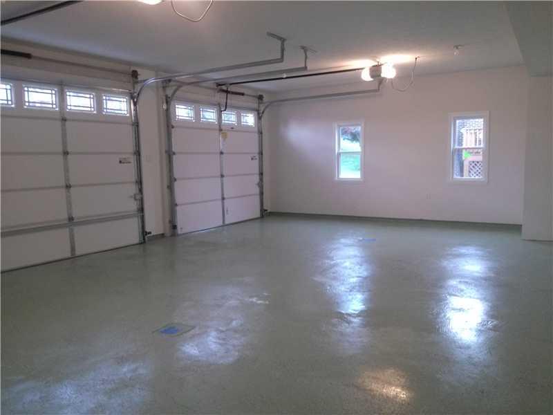 133 Klein Road New Brighton, PA 15066 - Photo 10 of 25 Parking Lot/Garage. OVERSIZED 3 ATTACHED GARAGE WITH A STORAGE AREA AND EPOXYED FLOOR