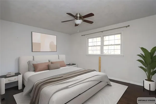 a bedroom with bed window and bed