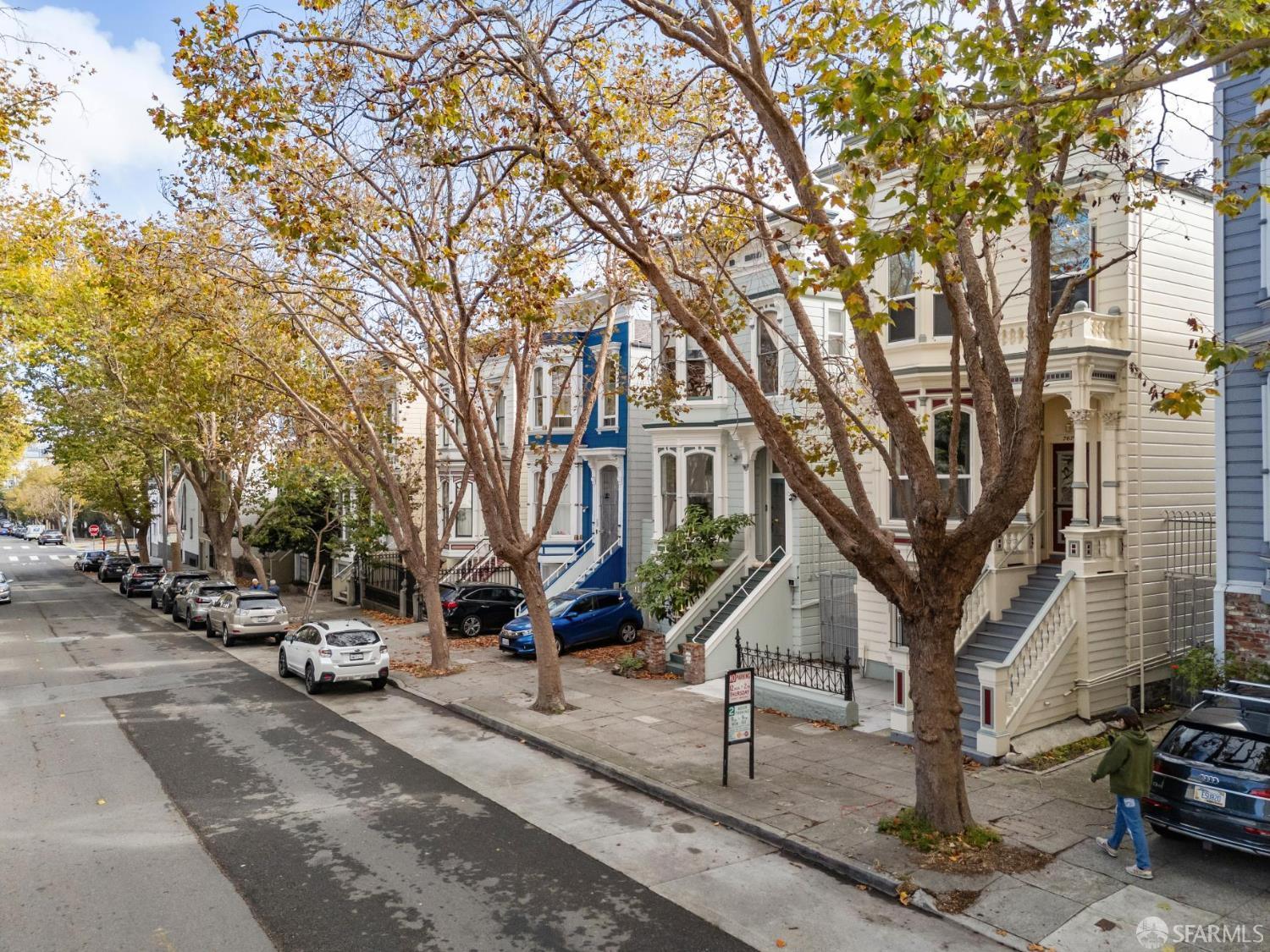 765-769 Grove Street San Francisco, CA 94102 - Photo 4 of 12 a view of a street with parked cars