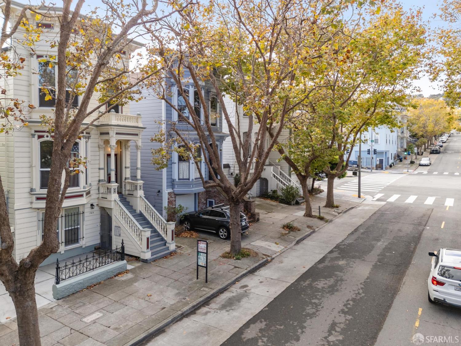 765-769 Grove Street San Francisco, CA 94102 - Photo 5 of 12 a front view of a house with a tree