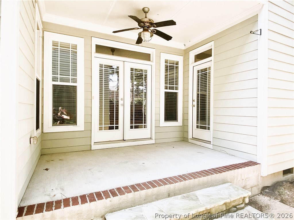 175 Pine Hawk Drive Spring Lake, NC 28390 - Photo 25 of 43 a view of a balcony with a ceiling fan and window