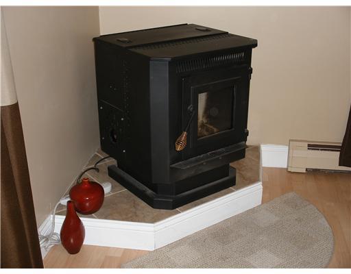 25 Mitchell Road Troy, ME 04987 - Photo 21 of 21 Other. Pellet stove in Dining Room