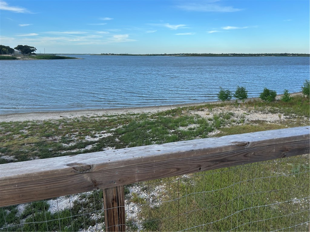 196 East Lakeview Trail Sandia, TX 78383 - Photo 7 of 39 a view of a lake with a yard