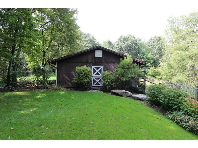 302 McKenzie Road Clinton, PA 15026 - Photo 22 of 23 Stable/Barn. THREE STALL 36 X 30 BARN WITH ELECTRIC, WATER AND AUTOMATIC DRINKING STATIONS IN EACH STALL. GARAGE DOOR ENTRY AT OTHER END OF BARN. NEW METAL ROOF.