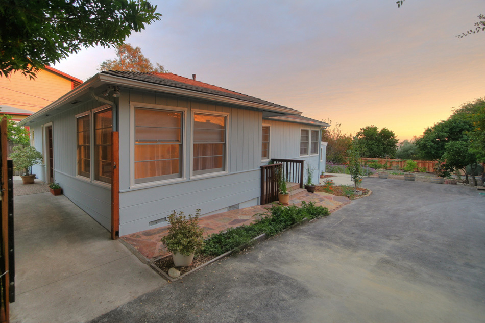 1064 Cheltenham Road Santa Barbara, CA 93105 - Photo 1 of 15 a front view of a house with garden
