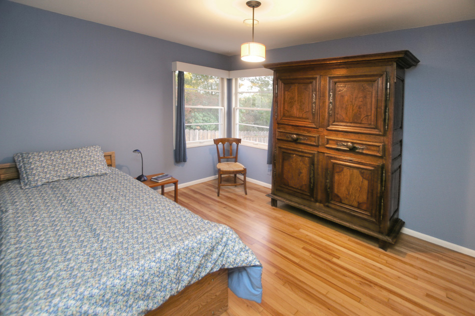 1064 Cheltenham Road Santa Barbara, CA 93105 - Photo 13 of 15 a bedroom with a bed and wooden floor