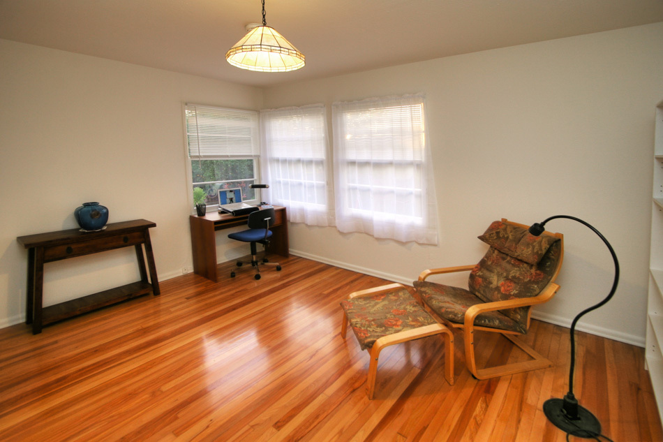 1064 Cheltenham Road Santa Barbara, CA 93105 - Photo 14 of 15 a living room with furniture and a wooden floor