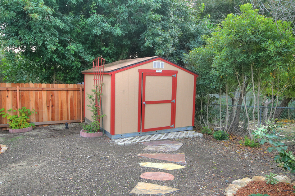 1064 Cheltenham Road Santa Barbara, CA 93105 - Photo 6 of 15 a front view of a house with a yard
